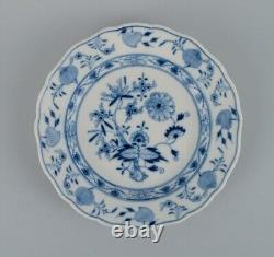 Meissen, a set of three Blue Onion dinner plates. Approx. 1900