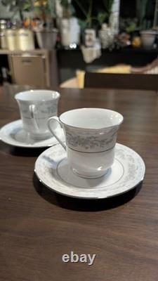 Vintage Set Of 10 Somerset China by NL Excel. Blue floral print with silver trim