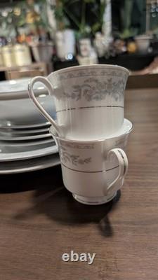 Vintage Set Of 10 Somerset China by NL Excel. Blue floral print with silver trim